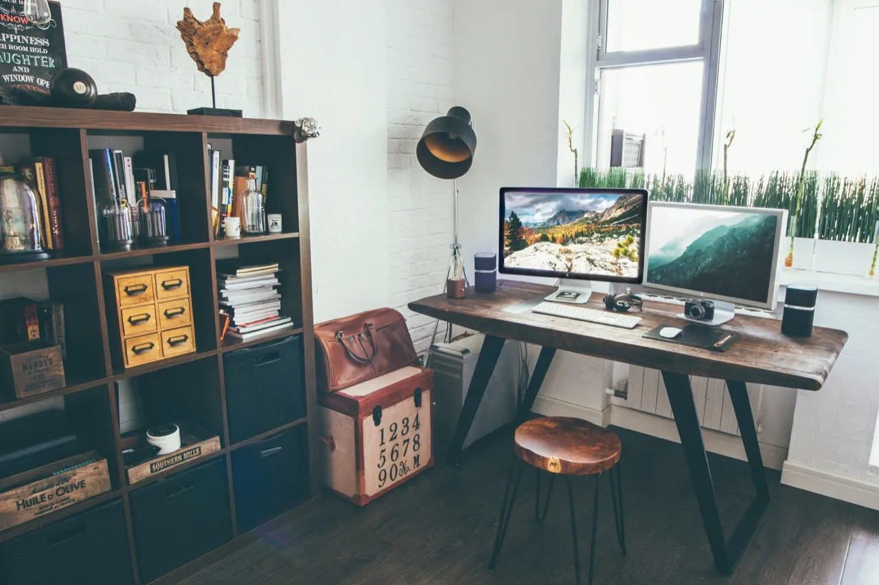 Rustic home office with iMac on a wooden desk